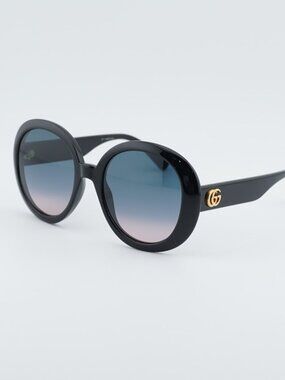 Gucci GG0712S 002 Women Sunglasses Black Round Frame, Blue Lenses